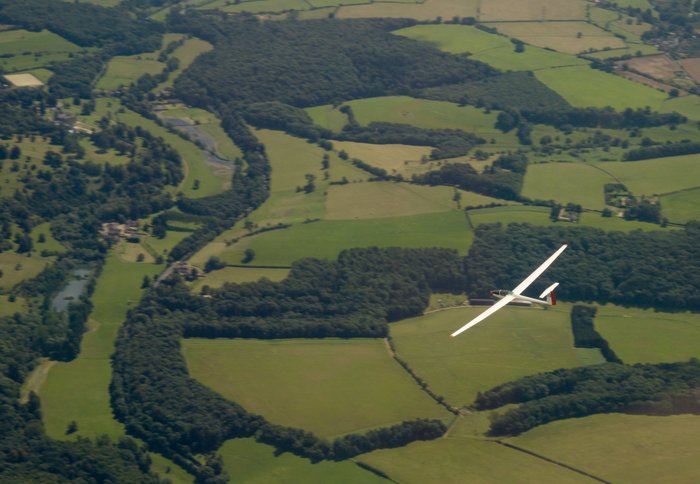 Glider over fields