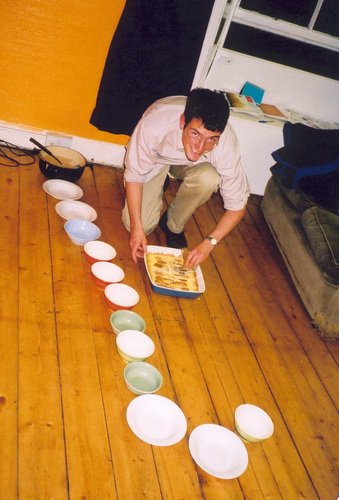 Guy serving pudding