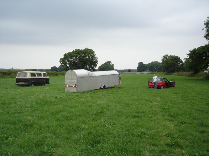 The Pig trailer in a field