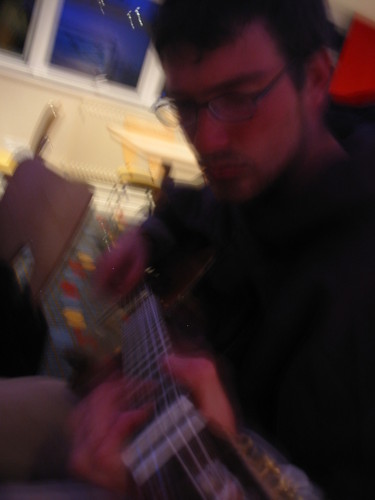Guy playing guitar