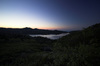 A random lake in the hills in the middle of the night