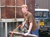 Bruce cutting firewood at Feshie