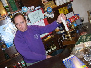 Andy Farr pouring pints